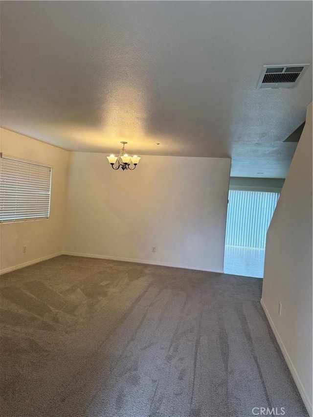 18318 Whitewater Way, Riverside, CA 92508 - carpeted spare room featuring a chandelier and baseboards