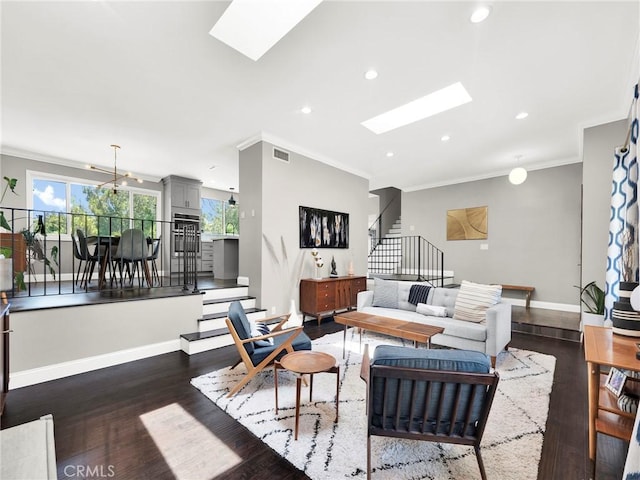 183 W Sidlee St, Thousand Oaks, CA 91360 - living area featuring a skylight, stairs, wood finished floors, ornamental molding, and recessed lighting