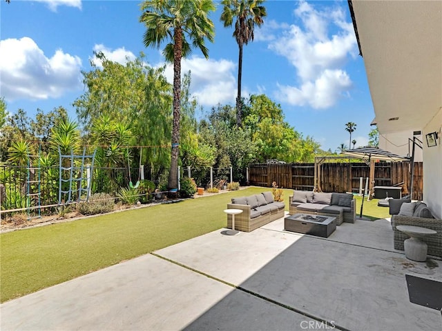 183 W Sidlee St, Thousand Oaks, CA 91360 - fenced backyard with an outdoor living space with a fire pit and a patio area