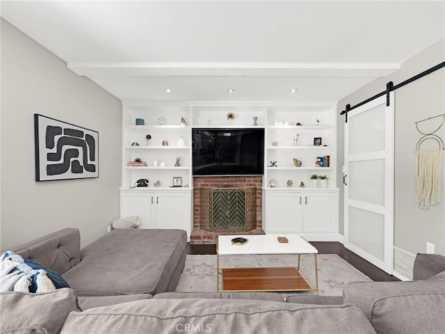 183 W Sidlee St, Thousand Oaks, CA 91360 - living room with beam ceiling, a barn door, and dark wood-style flooring