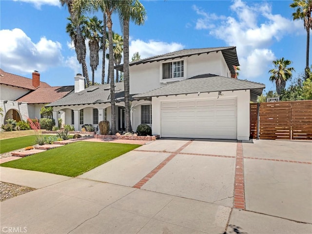 183 W Sidlee St, Thousand Oaks, CA 91360 - traditional-style house with stucco siding, an attached garage, and concrete driveway