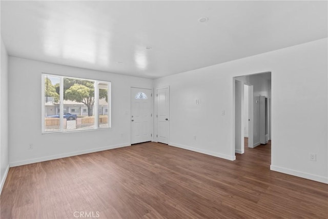 715 N 3rd St, Lompoc, CA 93436 - spare room featuring wood finished floors and baseboards
