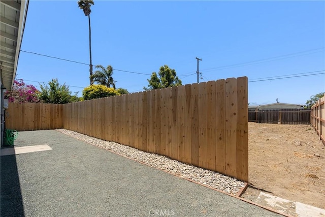 715 N 3rd St, Lompoc, CA 93436 - fenced backyard featuring a patio area