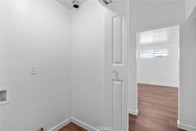 715 N 3rd St, Lompoc, CA 93436 - hall with dark wood-style flooring