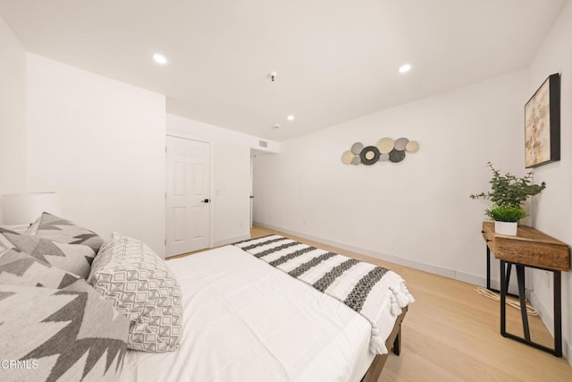 70 N Catalina Ave Unit 101, Pasadena, CA 91106 - bedroom featuring light wood finished floors and recessed lighting