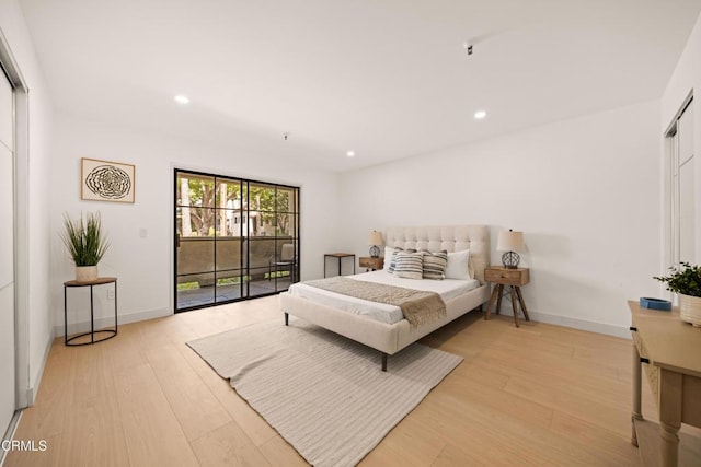 70 N Catalina Ave Unit 101, Pasadena, CA 91106 - bedroom with access to outside, light wood-style flooring, and recessed lighting