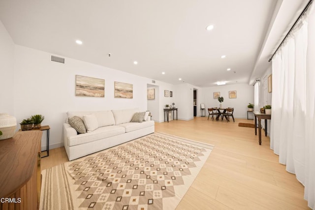 70 N Catalina Ave Unit 101, Pasadena, CA 91106 - living room featuring light wood-type flooring and recessed lighting