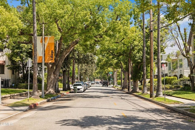 70 N Catalina Ave Unit 101, Pasadena, CA 91106 - view of asphalt road featuring sidewalks, traffic signs, and curbs