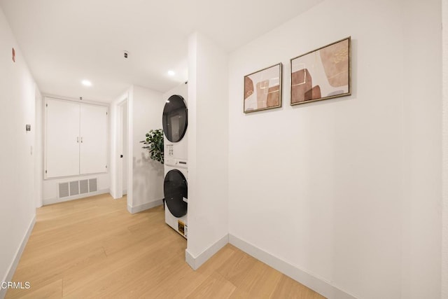 70 N Catalina Ave Unit 101, Pasadena, CA 91106 - corridor with stacked washer / dryer, light wood-type flooring, and recessed lighting