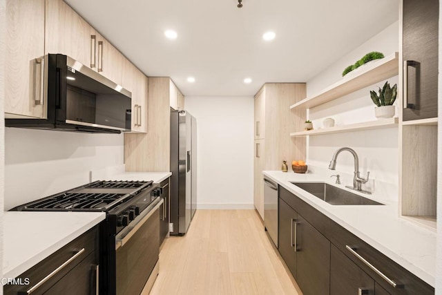70 N Catalina Ave Unit 101, Pasadena, CA 91106 - kitchen with appliances with stainless steel finishes, open shelves, light wood finished floors, light countertops, and recessed lighting
