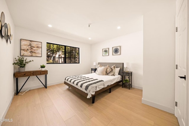 70 N Catalina Ave Unit 101, Pasadena, CA 91106 - bedroom with light wood-style floors and recessed lighting