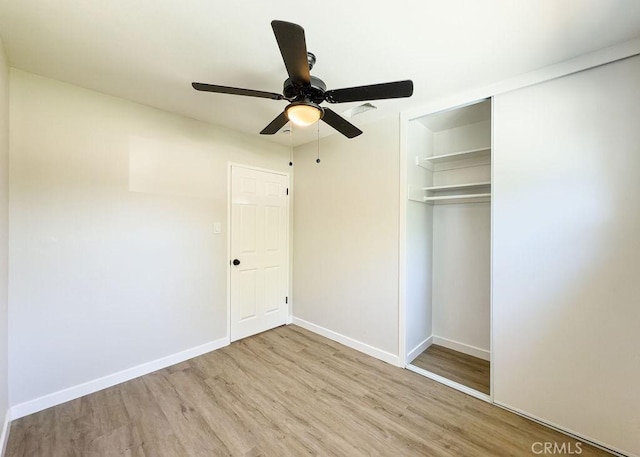 6692 Elm Ave, San Bernardino, CA 92404 - unfurnished bedroom with wood finished floors, a closet, and ceiling fan