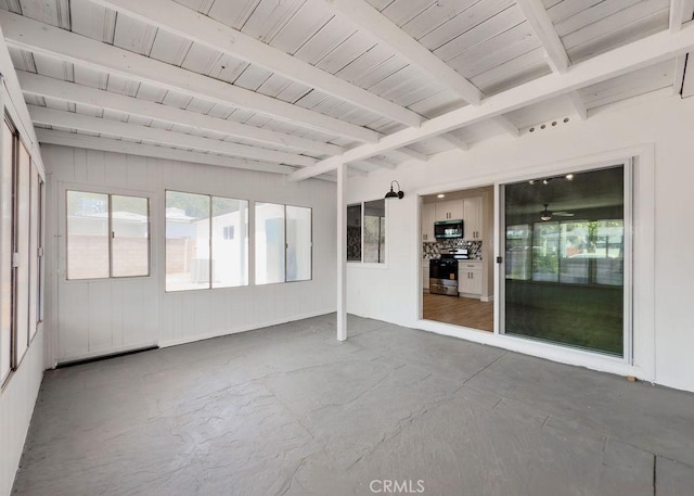 6692 Elm Ave, San Bernardino, CA 92404 - unfurnished sunroom featuring beam ceiling