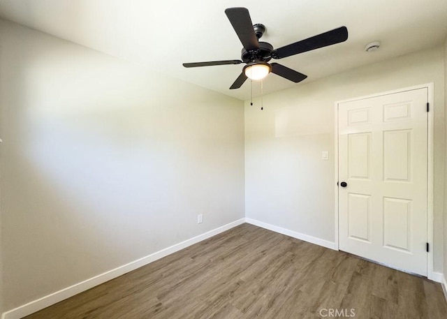 6692 Elm Ave, San Bernardino, CA 92404 - empty room with wood finished floors, a ceiling fan, and a smoke detector