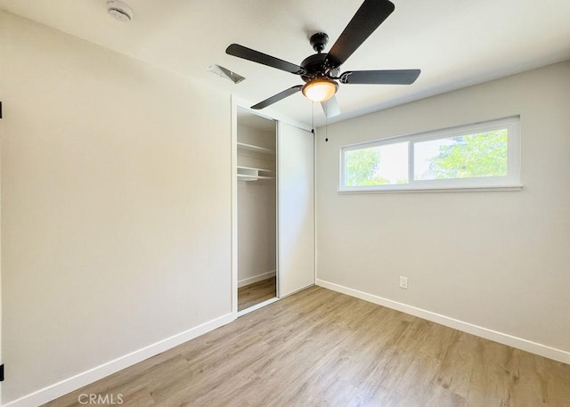 6692 Elm Ave, San Bernardino, CA 92404 - unfurnished bedroom with light wood-style floors, a closet, and a ceiling fan