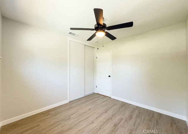 6692 Elm Ave, San Bernardino, CA 92404 - unfurnished room featuring light wood-style flooring and ceiling fan