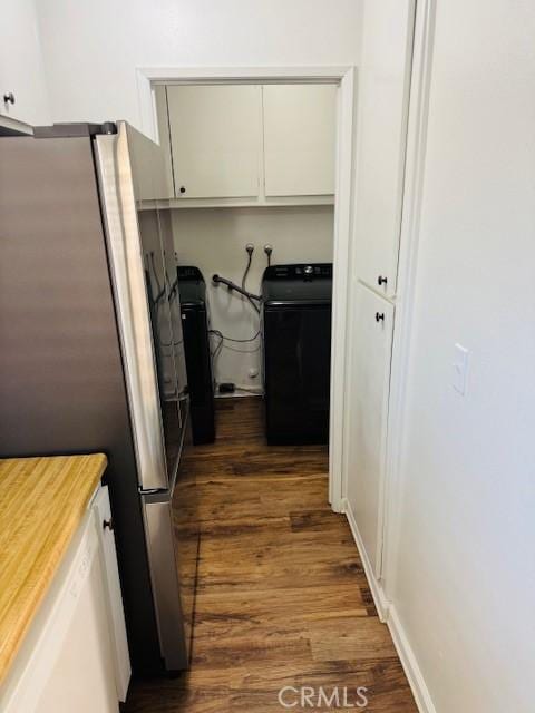 98 Lori Way, Banning, CA 92220 - laundry room featuring washer / dryer, cabinet space, and dark wood-style flooring