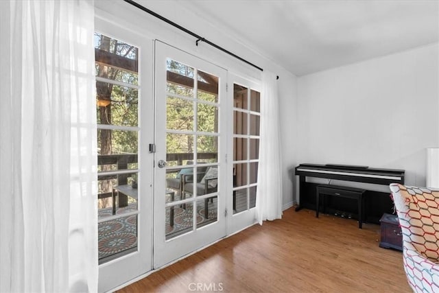 23717 Scenic Dr, Crestline, CA 92325 - entryway with french doors and wood finished floors