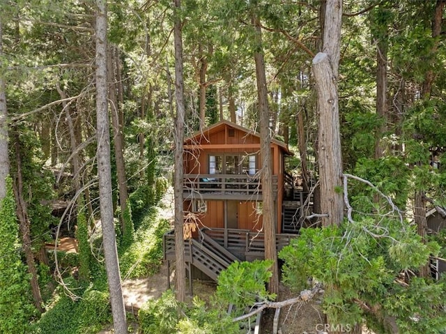 23717 Scenic Dr, Crestline, CA 92325 - view of outdoor structure featuring a forest view