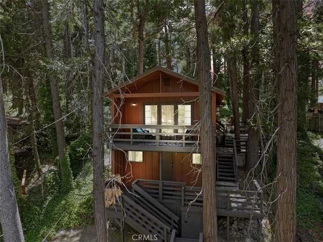 23717 Scenic Dr, Crestline, CA 92325 - view of front of house featuring stairway and a view of trees