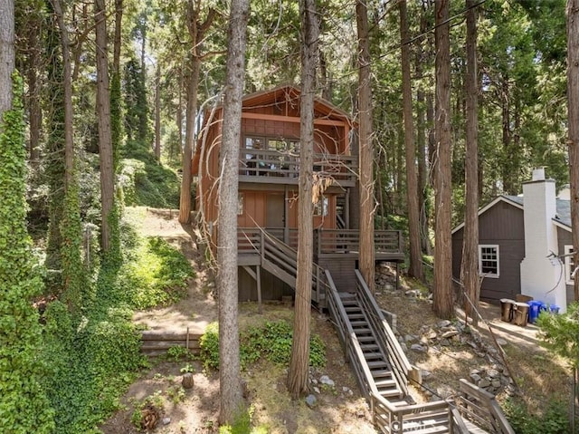 23717 Scenic Dr, Crestline, CA 92325 - view of outbuilding with stairs and a forest view