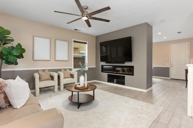339 Alamo Way, Oceanside, CA 92057 - living area with a ceiling fan, light wood-style floors, a glass covered fireplace, and recessed lighting