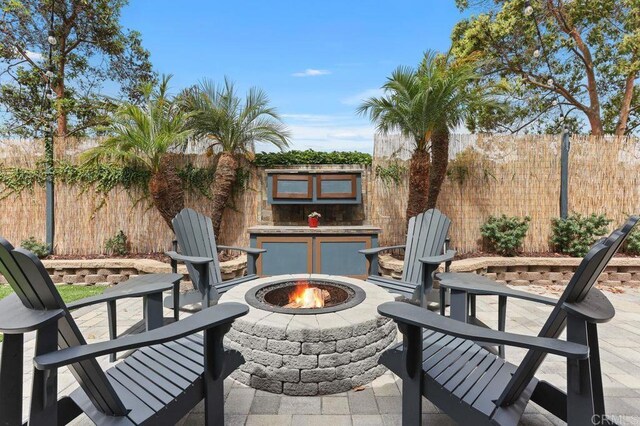 339 Alamo Way, Oceanside, CA 92057 - view of patio with an outdoor fire pit