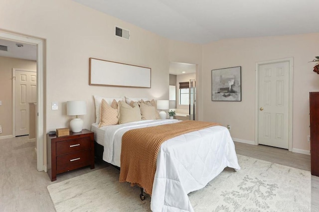 339 Alamo Way, Oceanside, CA 92057 - bedroom with light wood-style flooring and lofted ceiling