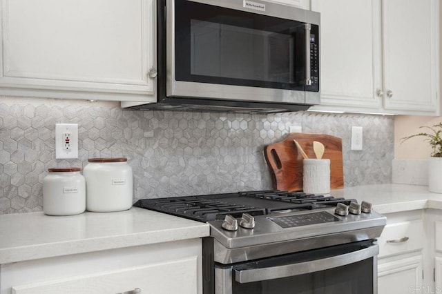 339 Alamo Way, Oceanside, CA 92057 - kitchen featuring appliances with stainless steel finishes, decorative backsplash, white cabinets, and light countertops