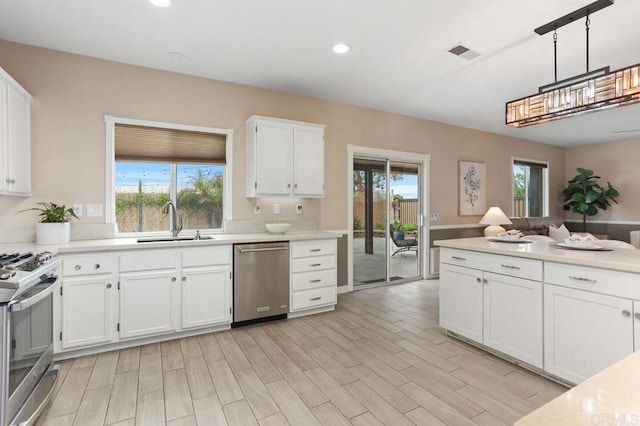 339 Alamo Way, Oceanside, CA 92057 - kitchen with appliances with stainless steel finishes, healthy amount of natural light, light countertops, and recessed lighting