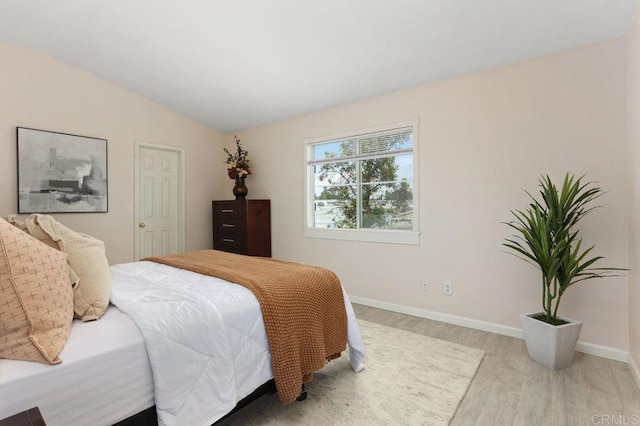 339 Alamo Way, Oceanside, CA 92057 - bedroom with light wood-style floors and vaulted ceiling