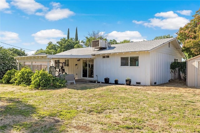 18 El Cerrito Dr, Chico, CA 95973 - back of house with board and batten siding, a yard, and a storage shed