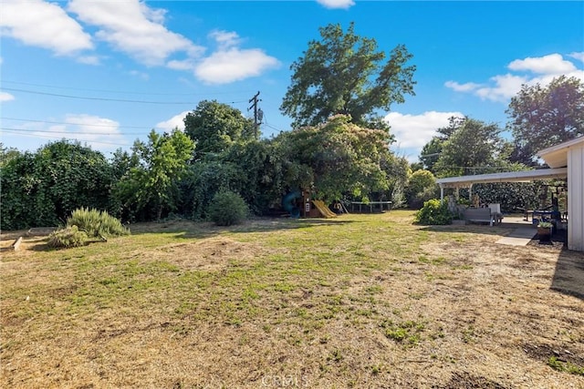 18 El Cerrito Dr, Chico, CA 95973 - view of green lawn with a playground