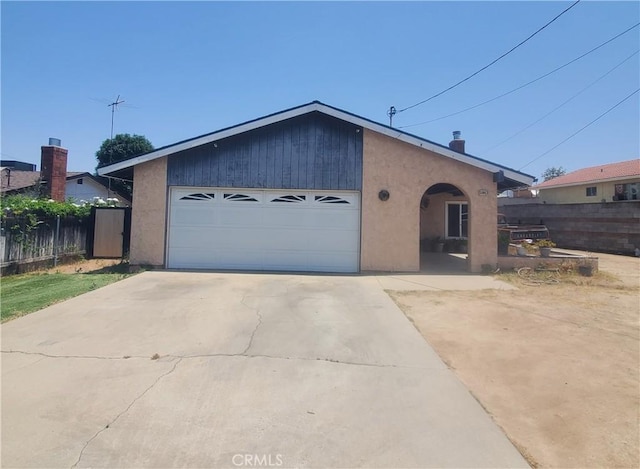 5983 Jones Ave, Riverside, CA 92505 - view of front of home featuring a garage and stucco siding