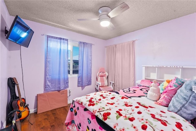 5983 Jones Ave, Riverside, CA 92505 - bedroom featuring wood finished floors, a textured ceiling, and ceiling fan