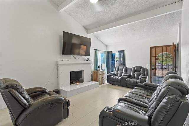 5983 Jones Ave, Riverside, CA 92505 - tiled living room featuring a textured ceiling and a tile fireplace
