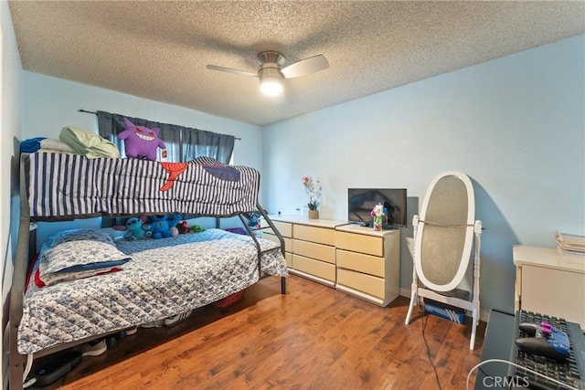 5983 Jones Ave, Riverside, CA 92505 - bedroom with a textured ceiling, wood finished floors, and ceiling fan