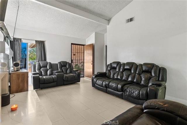 5983 Jones Ave, Riverside, CA 92505 - living area featuring a textured ceiling and light tile patterned floors