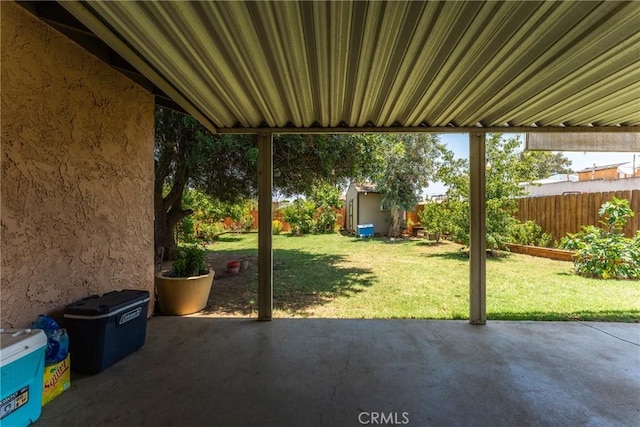 5983 Jones Ave, Riverside, CA 92505 - fenced backyard with a patio area and a storage shed
