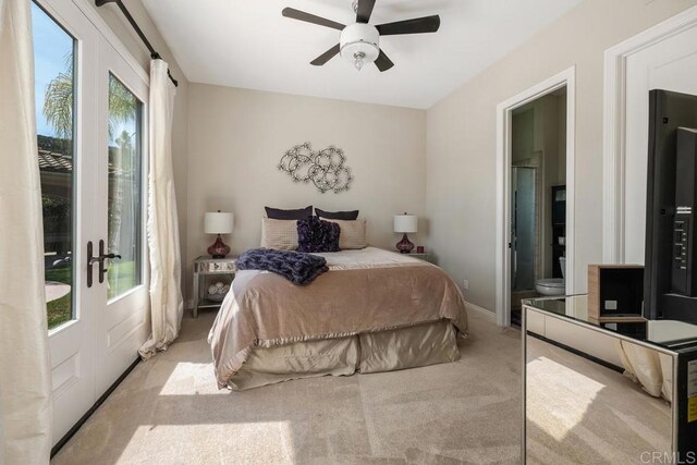 13388 Greenstone Ct, Scripps Miramar, CA 92131 - carpeted bedroom with multiple windows, ensuite bath, french doors, and ceiling fan
