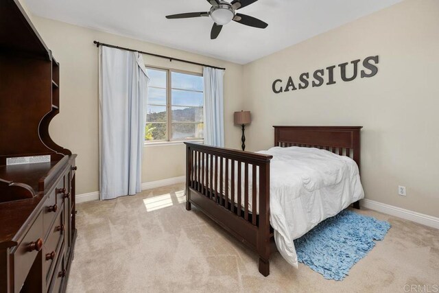 13388 Greenstone Ct, Scripps Miramar, CA 92131 - bedroom with light colored carpet and a ceiling fan