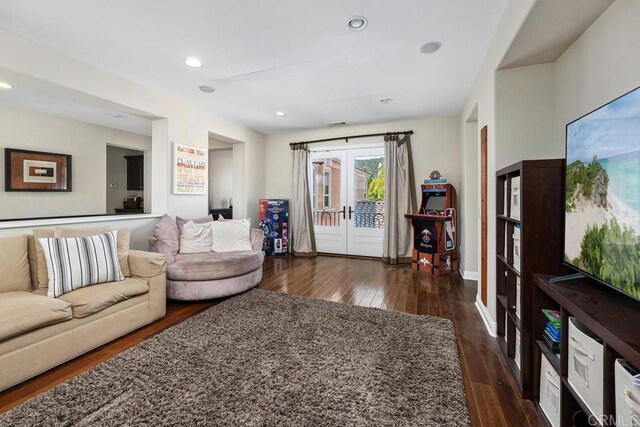 13388 Greenstone Ct, Scripps Miramar, CA 92131 - living room with dark wood-type flooring, french doors, and recessed lighting