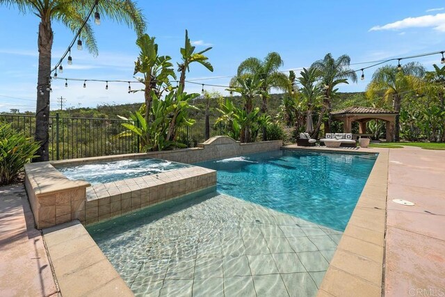 13388 Greenstone Ct, Scripps Miramar, CA 92131 - view of pool with a gazebo, a patio, and a pool with connected hot tub