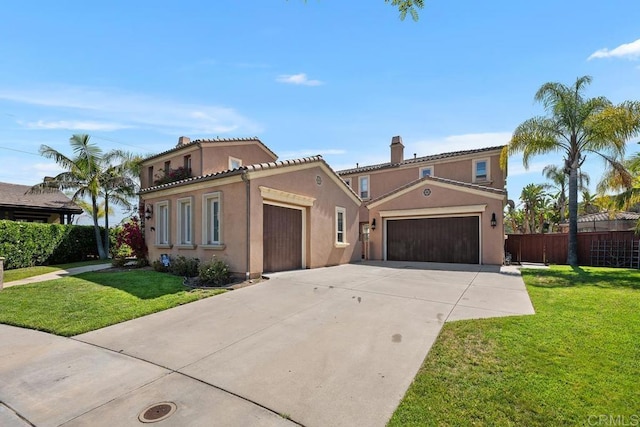 13388 Greenstone Ct, Scripps Miramar, CA 92131 - mediterranean / spanish house with an attached garage, concrete driveway, stucco siding, a chimney, and a tile roof