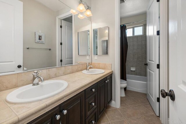 13388 Greenstone Ct, Scripps Miramar, CA 92131 - bathroom featuring double vanity, shower / bath combination with curtain, and tile patterned floors