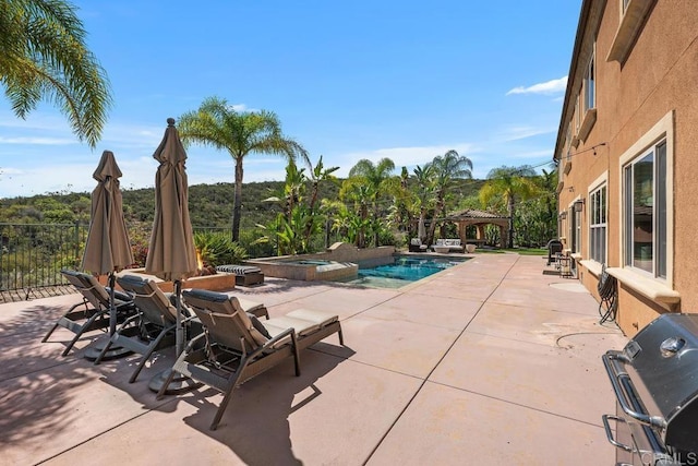 13388 Greenstone Ct, Scripps Miramar, CA 92131 - view of patio / terrace featuring area for grilling, a gazebo, and a pool with connected hot tub