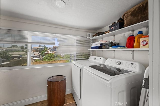 3144 Vista Ave, Lemon Grove, CA 91945 - washroom with separate washer and dryer and a textured ceiling