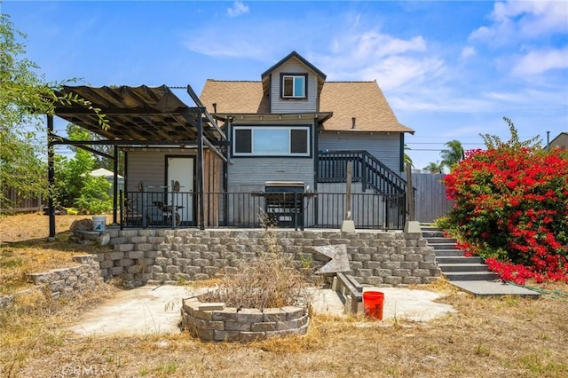 3144 Vista Ave, Lemon Grove, CA 91945 - rear view of house with stairs, a patio, a pergola, and a shingled roof