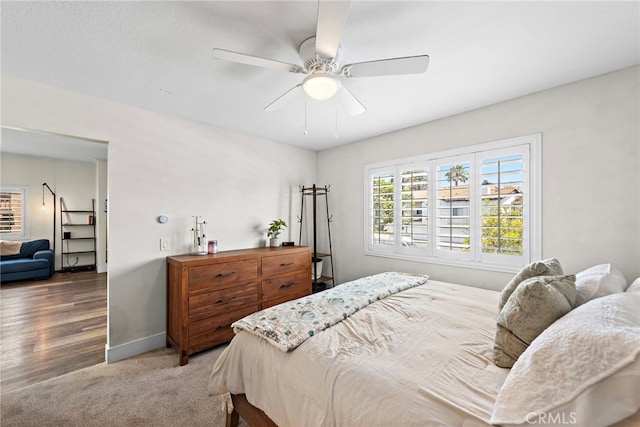55 Rabano Unit 240, Rancho Santa Margarita, CA 92688 - carpeted bedroom featuring baseboards and a ceiling fan