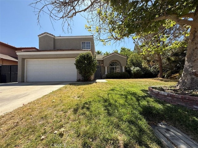 42523 56th St W, Lancaster, CA 93536 - view of front of property with stucco siding, an attached garage, a front yard, and driveway